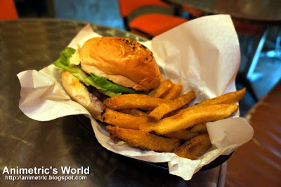 Black Angus Burger with Fresh Fries at Charlie's Grind & Grill